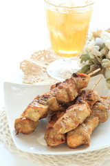 Indonasian food, chicken satey and iced tea