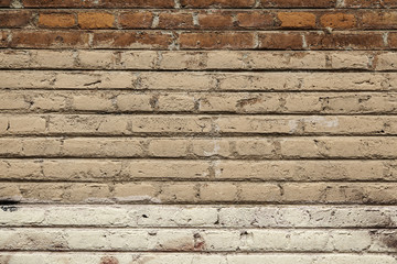 Battered old mud brick wall