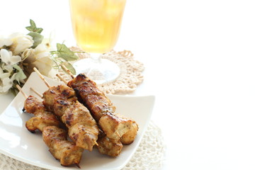 Indonasian food, chicken satey and iced tea