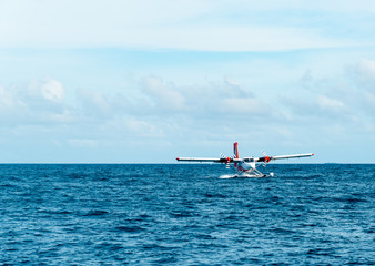 seaplane landing on the ocean