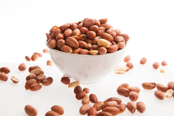 Peanuts in a white bowl.
