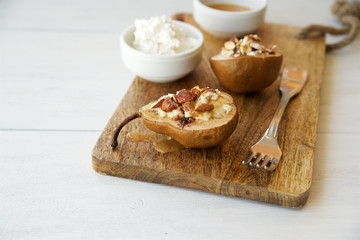 Baked pears with ricotta and almonds. Italian dessert 
