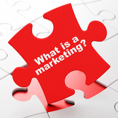 Advertising concept: What is a Marketing? on puzzle background