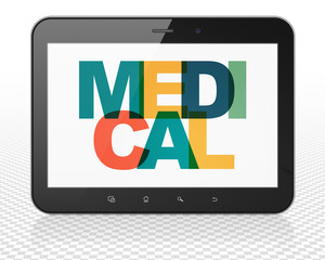Medicine concept: Tablet Pc Computer with Medical on  display