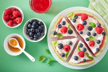  watermelon pizza slices with yogurt and berries, summer dessert © Olga Miltsova