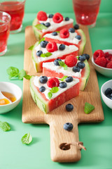 watermelon pizza slices with yogurt and berries, summer dessert