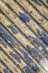 vintage striped texture with faded yellow paint, pedestrian safety surface. background, texture, vintage.