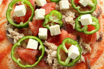 prepared pizza ready for baking
