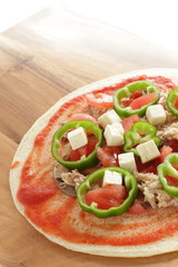 prepared pizza ready for baking