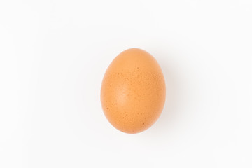 Single brown chicken egg on white background