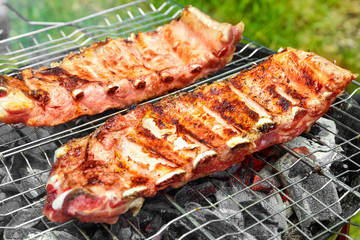 Appetizing juicy spare ribs grilled outdoors