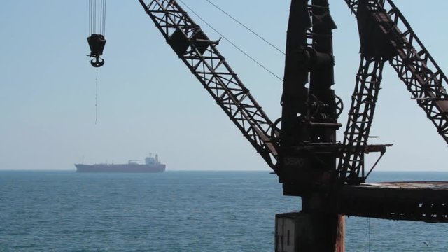 Ocean with ship and pier hook