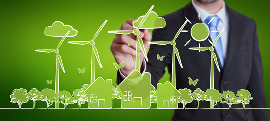 Businessman drawing renewable energy sketch