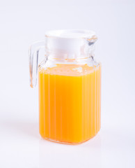 Orange juice or Orange juice in jug on background.