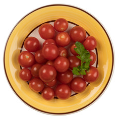 Fresh tomatoes on plate. Isolated on white background.