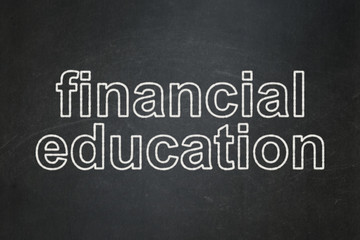 Learning concept: Financial Education on chalkboard background