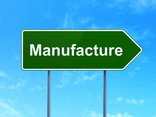Industry concept: Manufacture on road sign background