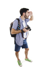 Summer holidays and tourism concept. Handsome man with backpack and camera. Isolated on white background