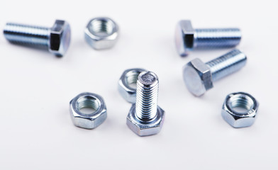 Nuts and bolts on white background. Isolated.