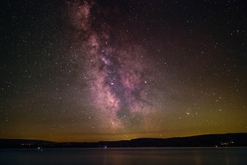 The center of the Milky Way above the Lake Constance as seen from the peninsula Mettnau at Radolfzell in Germany.