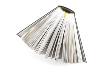 fanned book photographed from above