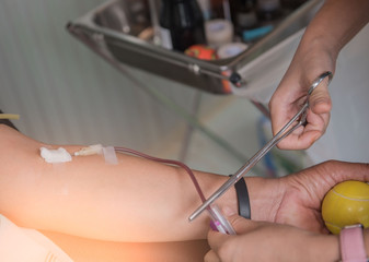 Blood donation by nurse in the hospital, health care.