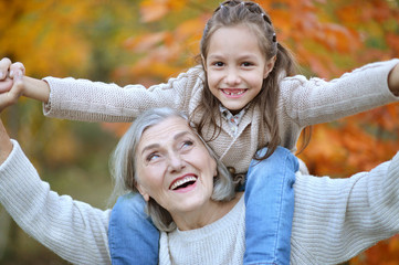 grandmother and grand daughter having fun