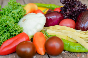 Vegetables on vintage wood background - autumn harvest. Rural still life
