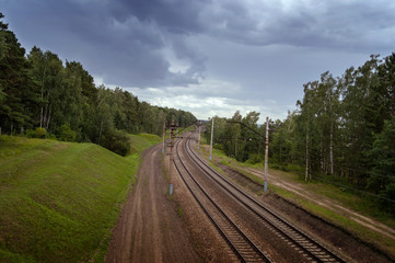 Fototapeta na wymiar empty railway with dark skies