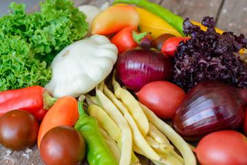 Vegetables on vintage wood background - autumn harvest. Rural still life