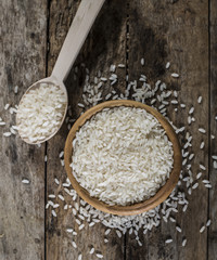 rice, jasmine rice, mali rice in Ladle and basket on the wood background