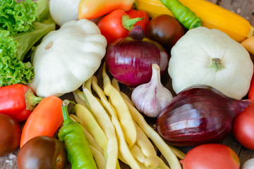 Vegetables on vintage wood background - autumn harvest. Rural still life