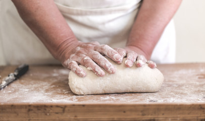 Grand mother makes traditional dumplings