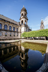 Morning view on the Court of Appeal building with fountain on the Bruhl terrace in Dresden city, Germany