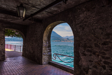 View form medieval arch on lake Como, Italy