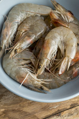 Whole fresh raw shrimps seafood in bowl ready to cook