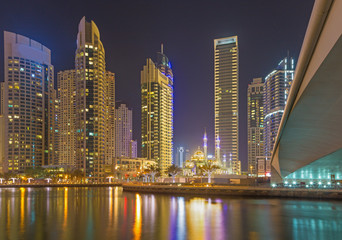 Fototapeta na wymiar Dubai - The nightly Marina and the mosque.