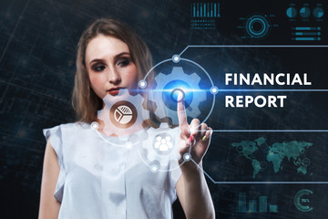 The concept of business, technology, the Internet and the network. A young entrepreneur working on a virtual screen of the future and sees the inscription: Financial report