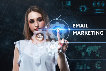 The concept of business, technology, the Internet and the network. A young entrepreneur working on a virtual screen of the future and sees the inscription: Email marketing