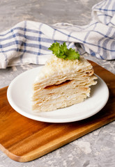 Cake Napoleon. Russian cuisine, multi layered cake with pastry cream, close up