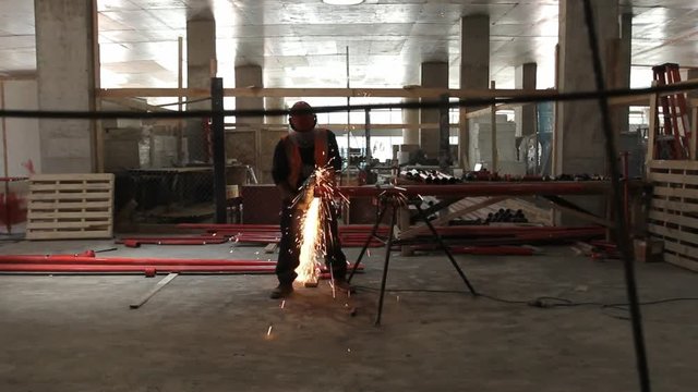 Steel worker with sparks