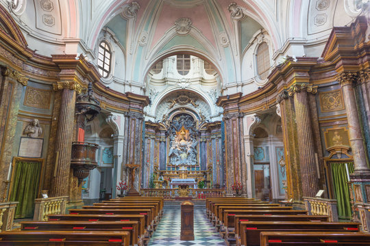 TURIN, ITALY - MARCH 16, 2017: The nave of baroque church Chiesa di Santa Maria di Piazza with the main altar by Pietro Francesco Guala (1698 - 1757).