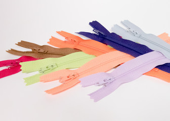 Collection of colorful plastic zippers