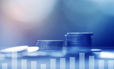 Row of coins on wood background for finance and Saving concept,Investment, Economy, Soft focus and dark style.