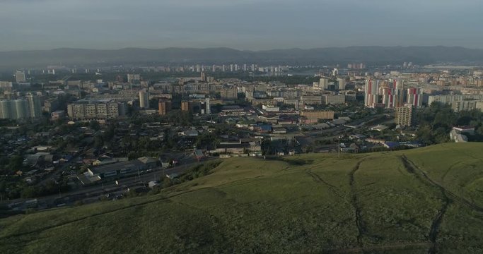 Church of Paraskeva Pyatnitsa is symbol of Krasnoyarsk. City in Siberia, Russia. Russian old architecture. Aerial drone flight around. 4K format