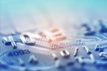 Double exposure Rows of coins of Credit cards on the table,finance and business concept,Money,soft focus and blurred style,dark tone.