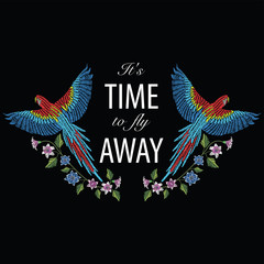 Macaw ara parrot with narcissus, tulip anfd lily flower. Embroidery stitches stylized vector illustration with text it's time to fly away. Traditional floral pattern for textile and fabrics. © romanpoljak