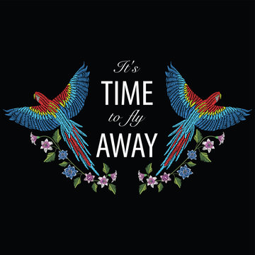 Macaw ara parrot with narcissus, tulip anfd lily flower. Embroidery stitches stylized vector illustration with text it's time to fly away. Traditional floral pattern for textile and fabrics.
