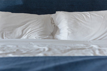 Fototapeta na wymiar white pillows on bed