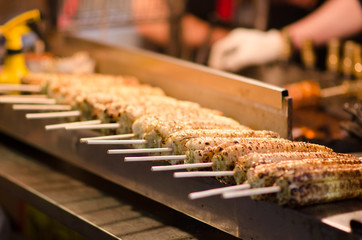 Street food preparing outdoors in Asian country
